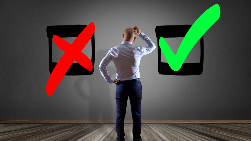 Image of a man confused between what's right and wrong
